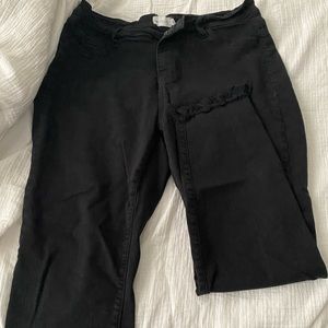 Black jeans, fringe at ankle